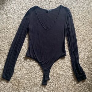 Lulu’s black V neck bodysuit